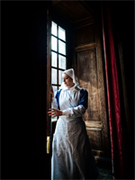 Nurse closing the shutters at Dunham Massey (Image: Christopher Davies / Correct Aperture Photography)