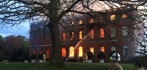 Clandon Park on fire - the flames reached the north side (Image: © Alex Greenwood)